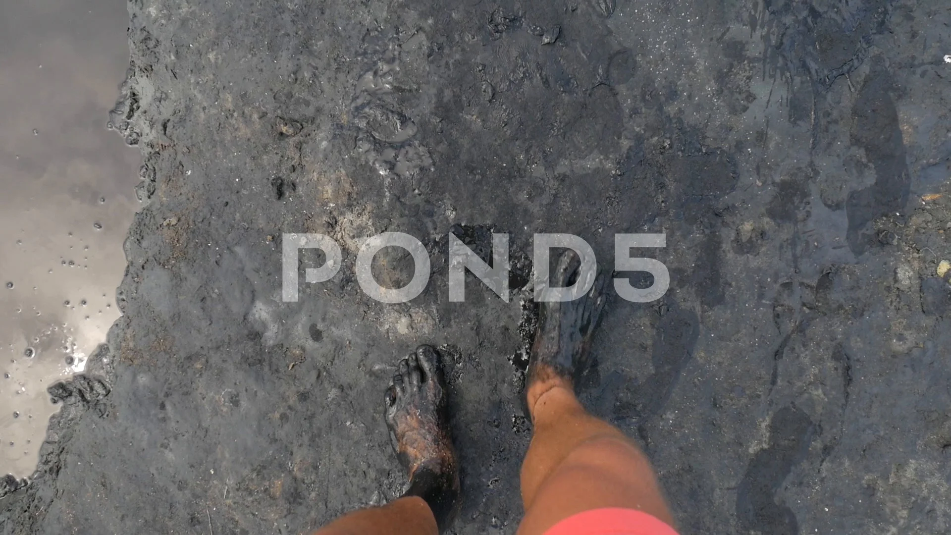 Man with Dirty Feet Walking Barefooted near Salty Lake Pond. HD Slowmotion  POV.