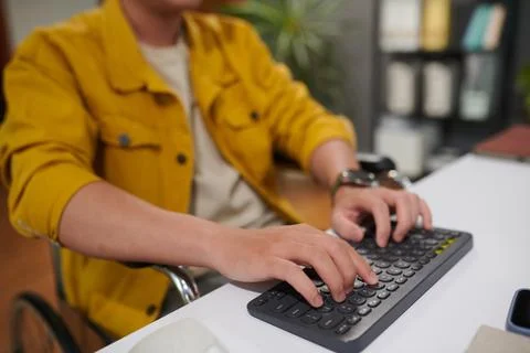 Man with Disability Answering E-mails and Coding 스톡 사진