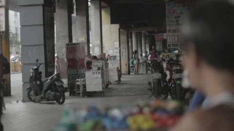 A man with disability eating while watching his store Stock Footage 230088356