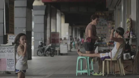 A man with disability eating while watching his store Stock Footage 230088396