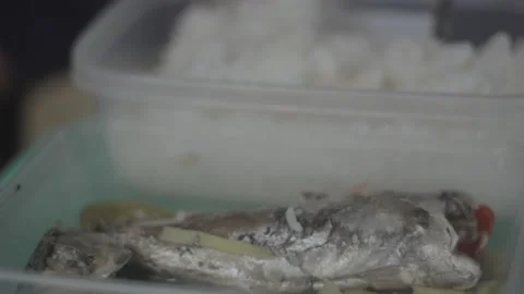 A man with disability eating while watching his store Stock Footage 230089236