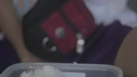 A man with disability eating while watching his store Stock Footage 230089258