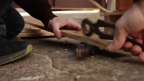 A man disassembles a pallet Stock Footage 152232548