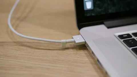 Man disconnects a wire and a computer. Macro shot 스톡 동영상 72632149