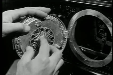 Man discovering hidden diamonds behind clock dial Stock Footage 14524880