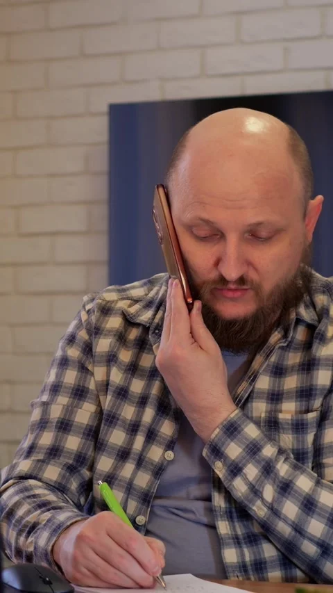 Man discusses plans using tools. Professional man communicates details at desk Stock-Footage 344727053