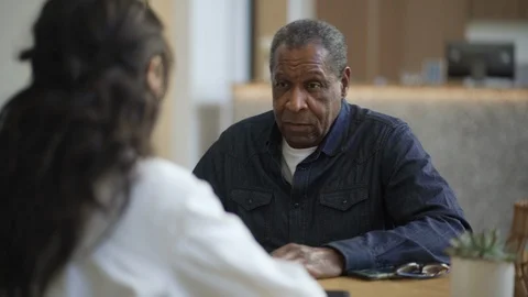 Man discussing his problems with physician in hospital Video stock 105600278