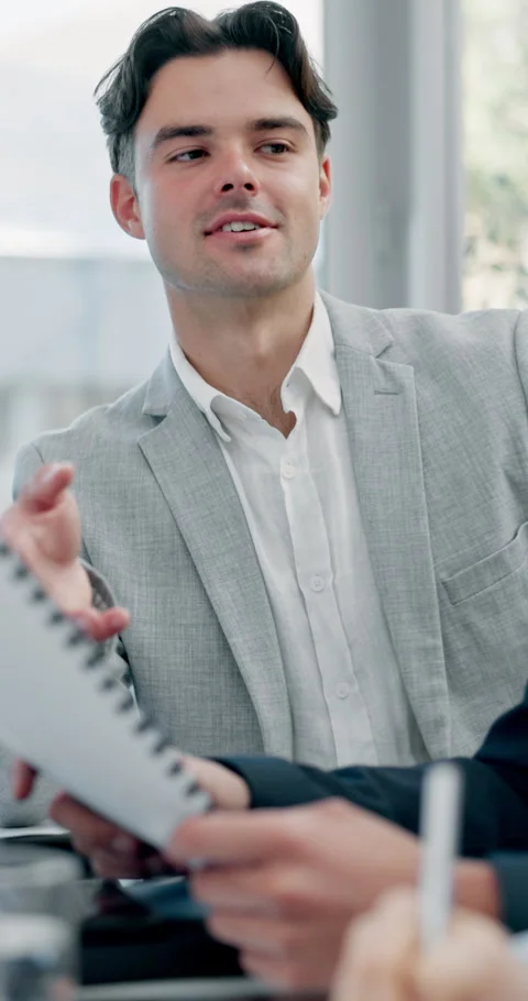 Man, discussion and documents at office meeting with feedback, notes and insight Stock Footage 335746660
