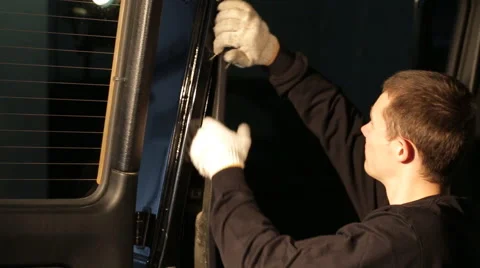 Man dismantle the machine for sound insulation Stock Footage 56024141