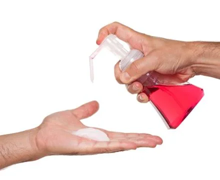 Man dispensing hand soap Stock Photos