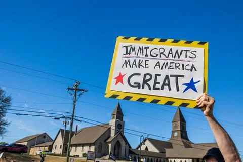 Man displays pro immigrant sign at No Kings 3 event Stock Photos