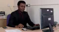 Man is distracted by a text on his mobile phone HD Footage
