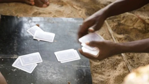 Man distributing cards while playing with friends Stock Footage 71563800