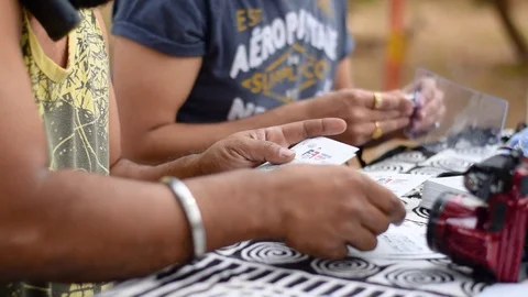 Man distributing identity cards in Event Vídeo Stock 89931268