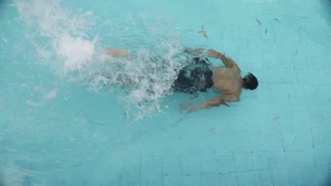 Man Dive and Swimming  in pool and celebrate Achievement with coach Stock Footage 144262049