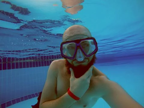 Man Dives Stock Photos