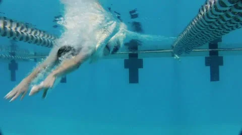 Man dives to the swimming pool Stock Footage 10772224