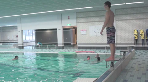 Man Diving In Pool in Slow Motion Stock Footage 34318483