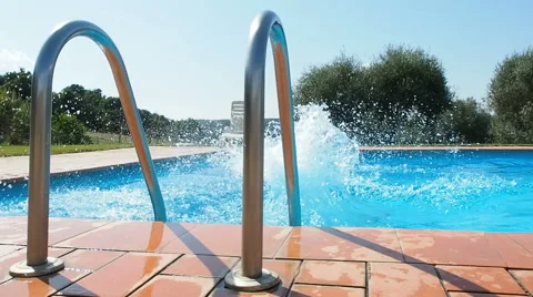 Man diving in swimming pool Stock Footage 64932802