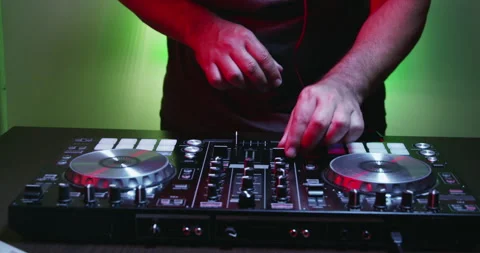 Man of DJ Tweak Various Track Controls on DJ Deck Stock Footage 243382140