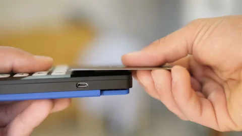 Man do contactless payment with credit card in a store,digital cashless shopping Stock Footage 170731384