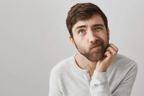 Man do not know how to solve problem. Indoor shot of clueless troubled european Stock Photos