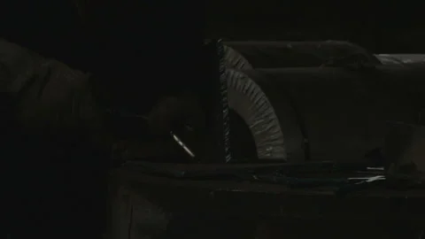 Man do welding in the dark with a break Stock Footage 88059055