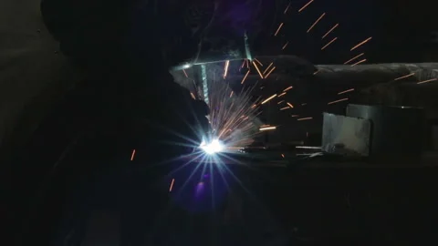 Man do welding in the dark to the last Stock Footage 88081716