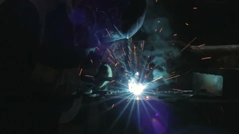 Man do welding in the dark with sound Stock Footage 88059704