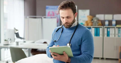 Man, doctor and reading on tablet in hospital for research, medical results and Stock Footage 314934665