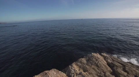 Man Does Cliff Jump Flip Jump In Slow Motion. Into Ocean Stock Footage 55296505