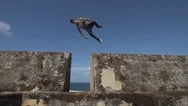 Man Does Crazy Running Flip Parkour Line Along Building Ruins Stock Footage