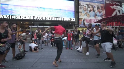 Man Does Double Full Twisting Backflip at Times Square, Barefoot Stock Footage 146553919