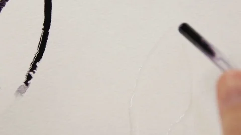 Man Does Element of Picture on White  in Black Colour Stock Footage 73085030