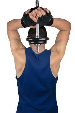 Man does exercise with dumbbells Stock Photos