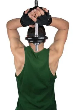 Man does exercise with dumbbells Stock Photos