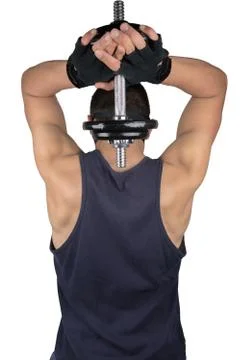 Man does exercise with dumbbells Stock Photos