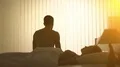 The man does exercise on the sunshine background 4k or 4k+ Resolution