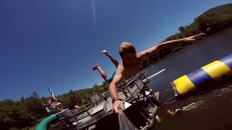 Man does a flip into a lake Video stock 68559052