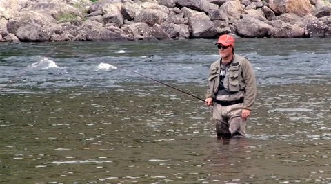 Man does fly fishing at the river in Sogndal, Norway. Stock Footage 59726421