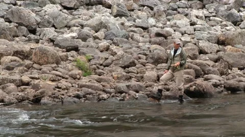 Man does fly fishing at the river in Sogndal, Norway. Stock Footage 59726588