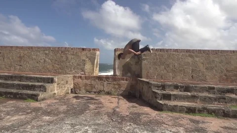 Man Does Freerunning Parkour Line Gainer Front Flip Style San Juan Stock Footage 79277500