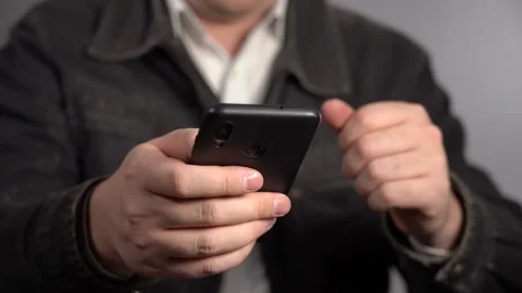 A Man Does His Small Business From A Smartphone. Stock Footage 155019219