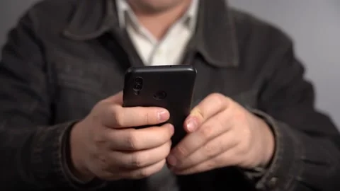 A Man Does His Small Business From A Smartphone. Stock Footage 155531626