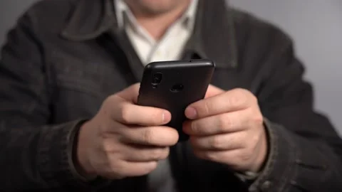 A Man Does His Small Business From A Smartphone. Stock Footage 166995851