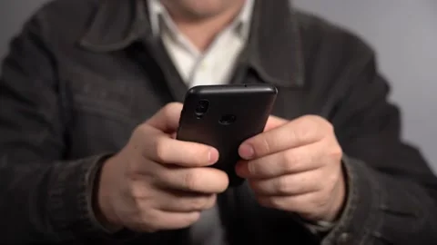 A Man Does His Small Business From A Smartphone. Stock Footage 167213140