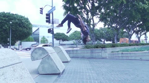 Man Does Layout Wall Flip in Slow Motion. Down Town LA Stock Footage 50481266