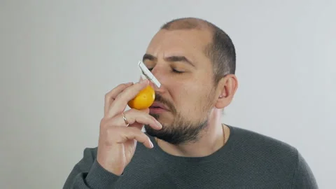 The man does not smell and taste, the sense of smell is lost, the symptoms of Stock-Footage 142602085