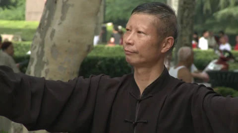 Man does Tai Chi in Park 1 Stock Footage 37702907