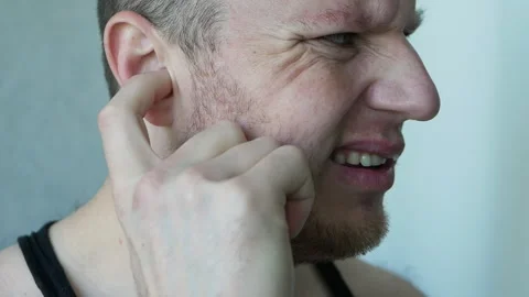 The man doesn't hear anything. People have a problem with hearing Stock Footage 275823454